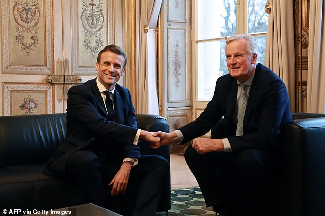 Barnier pictured with Emmanuel Macron at the Elysee Palace in Paris, on January 31, 2020, a few hours before Britain officially left the European Union.