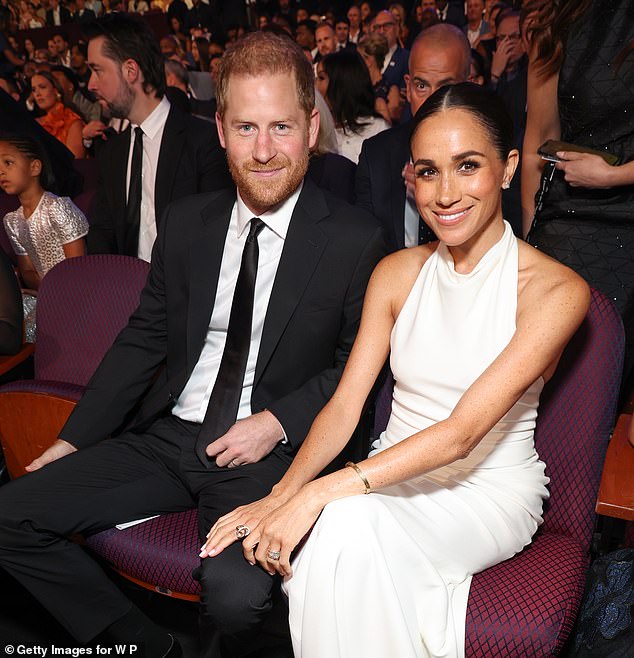 Meghan Markle beamed with pride as Prince Harry received a prestigious military honour at the ESPY Awards at the Dolby Theatre in Los Angeles in July this year.