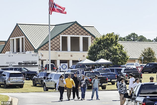 A mother described the scenes outside the high school as 'chaos'