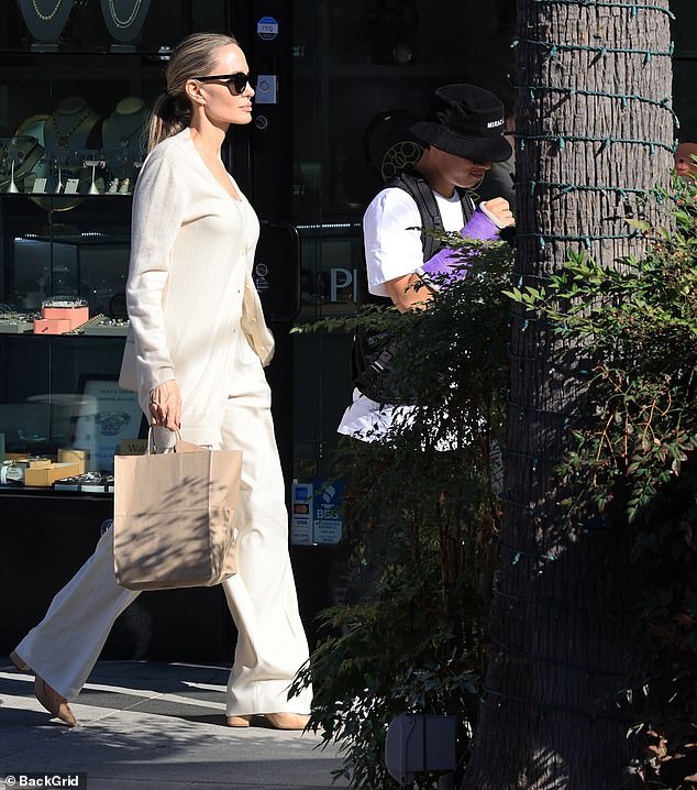 Pax looked in good spirits as he spent some quality time with his mom over lunch in Beverly Hills.