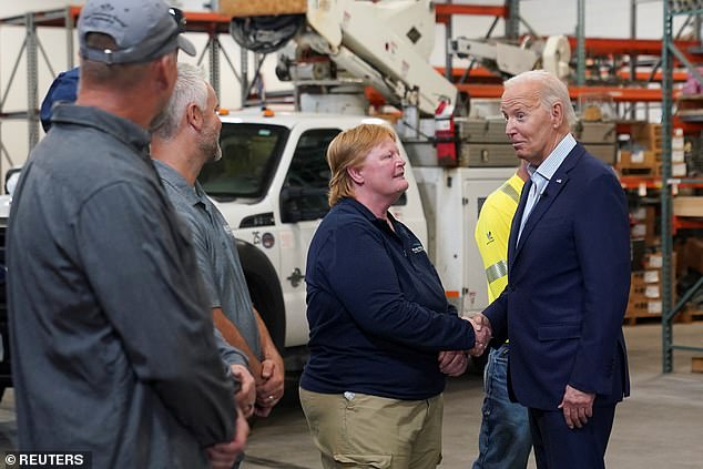 President Joe Biden (R) spoke with workers at Vernon Electric Cooperative in Westby, Wisconsin, on Thursday before delivering remarks on providing power to rural areas in the important swing state.