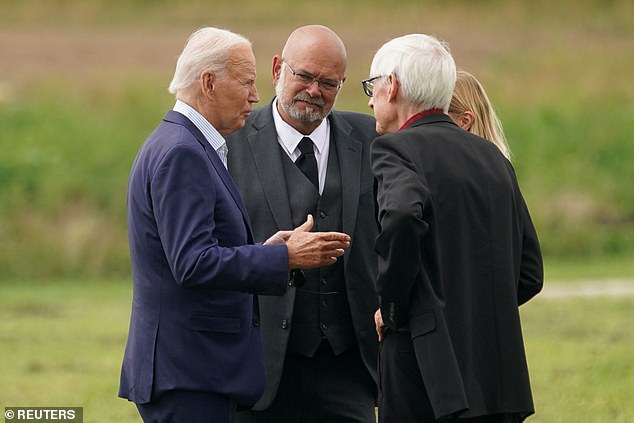 President Joe Biden (left) greets Westby Mayor Danny Helgerson (center), Wisconsin Secretary of State Sarah Godlewski, and Governor Tony Evers (right) upon his arrival in rural Wisconsin on Thursday