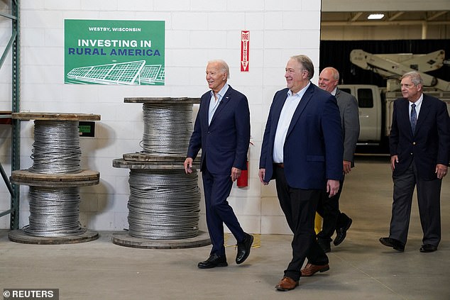 President Joe Biden (left) toured the Vernon Electric Cooperative in Westby, Wisconsin, on Thursday, touting investments in green energy to power rural areas of the U.S. He was joined on the trip by Agriculture Secretary Tom Vilsack (right).