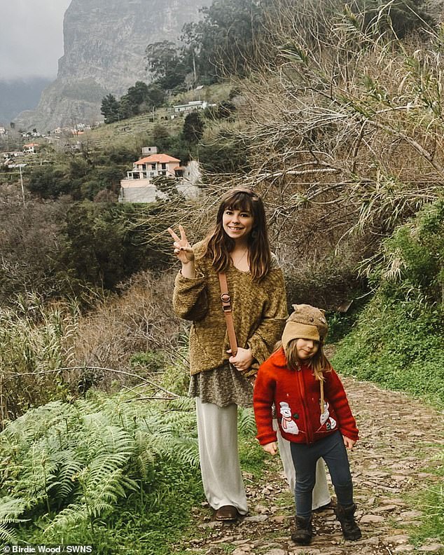 Pictured with Mavie, Birdie said her two young daughters are adventure fans and love flying in airplanes.