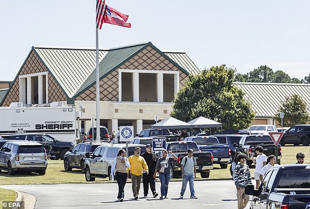 A mother described the scenes outside the high school as 'chaos'