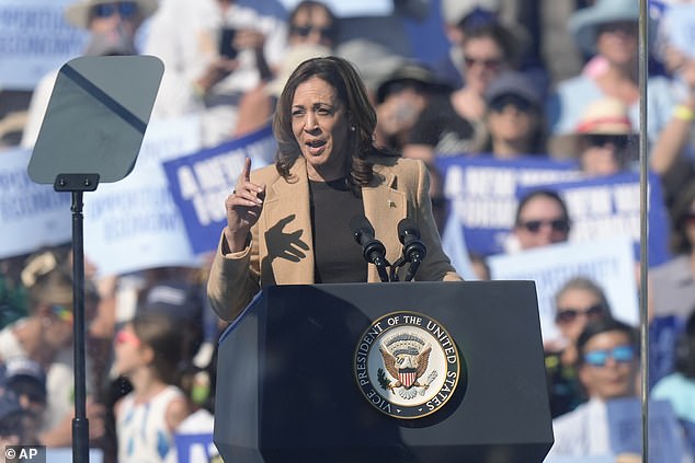 On Thursday, Trump criticized the Justice Department and suggested that Russian President Vladimir Putin would prefer to have Kamala Harris in the White House in November. Harris is pictured at an event in North Hampton, New Hampshire, on Wednesday.