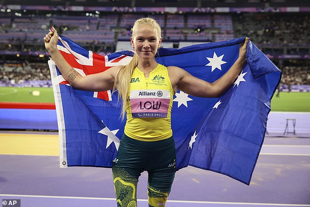 Low also set a new world record in the T63 long jump event in Paris (pictured after winning the final).