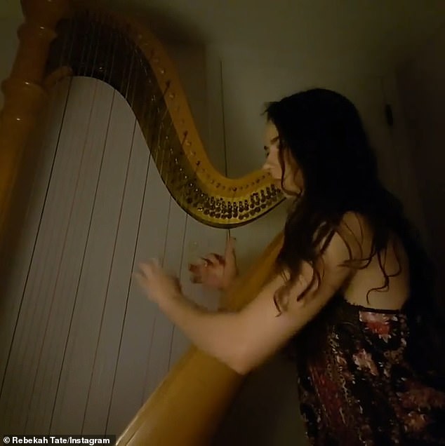 Tate appears playing the harp in a video on her Instagram page.