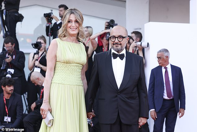 He was forced to apologize to his wife Federica Corsini (pictured, left)