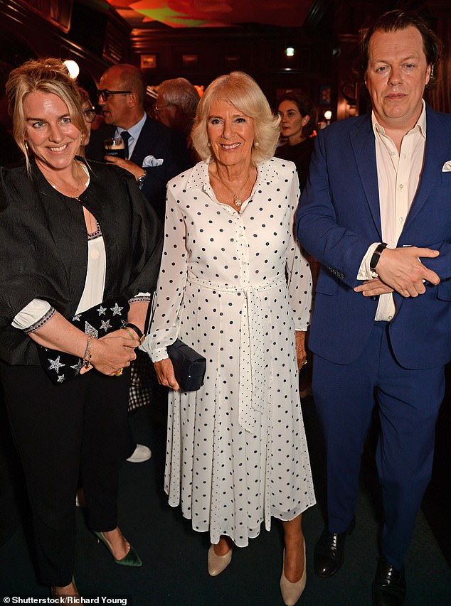 Laura Lopes, Queen Camilla and Tom Parker Bowles at the launch of the book Cooking and The Crown in London