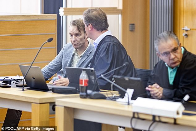 Defendant Christian B (L) is seen with his lawyer Friedrich Fuelscher (C) and Atilla Aykac as he arrives for a session of his trial at the court in Braunschweig, northern Germany, September 5, 2024.