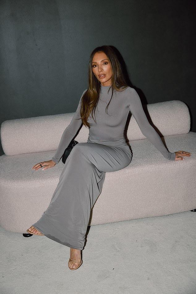 Meanwhile, Nadia (pictured) chose a figure-hugging grey maxi dress that featured long sleeves.