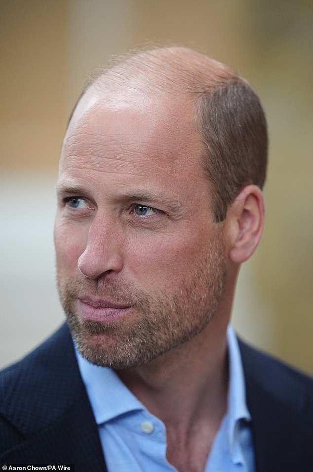 Prince William sported a beard today as he returned to royal duties following his summer break.