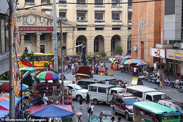 Trying to cross the streets in the Philippines is like 