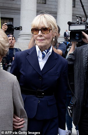 E. Jean Carroll was photographed leaving court on Friday, flanked by her attorney.