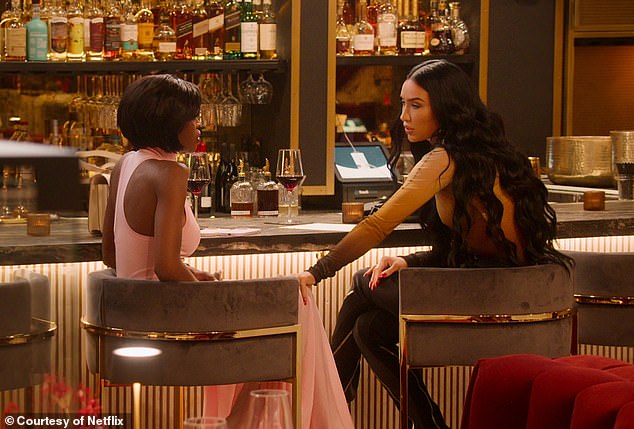 A scene from season 8 in which Bre Tiesi (right) tells co-star Chelsea Lazkani a rumor about her husband.