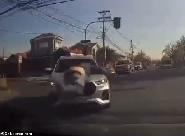 A car's dashcam captured the moment a father was hit by a pickup truck driven by a boy who had gotten into a fight with his son at school.