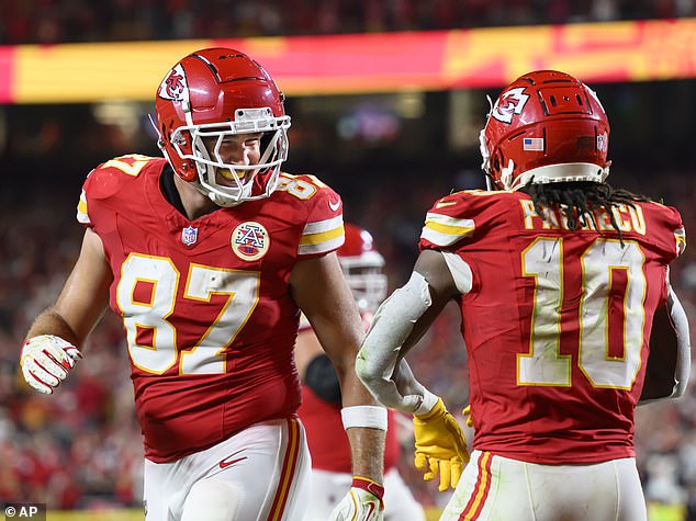 Kelce congratulates Chiefs running back Isiah Pacheco after he scored a touchdown