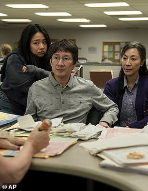 Quan starred in the critically acclaimed 2022 sci-fi comedy Everything Everywhere All at Once as Waymond Wang (center)