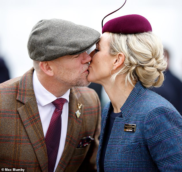 Mike and Zara Tindall share a kiss while attending St Patrick's Thursday at the Cheltenham Festival last year.