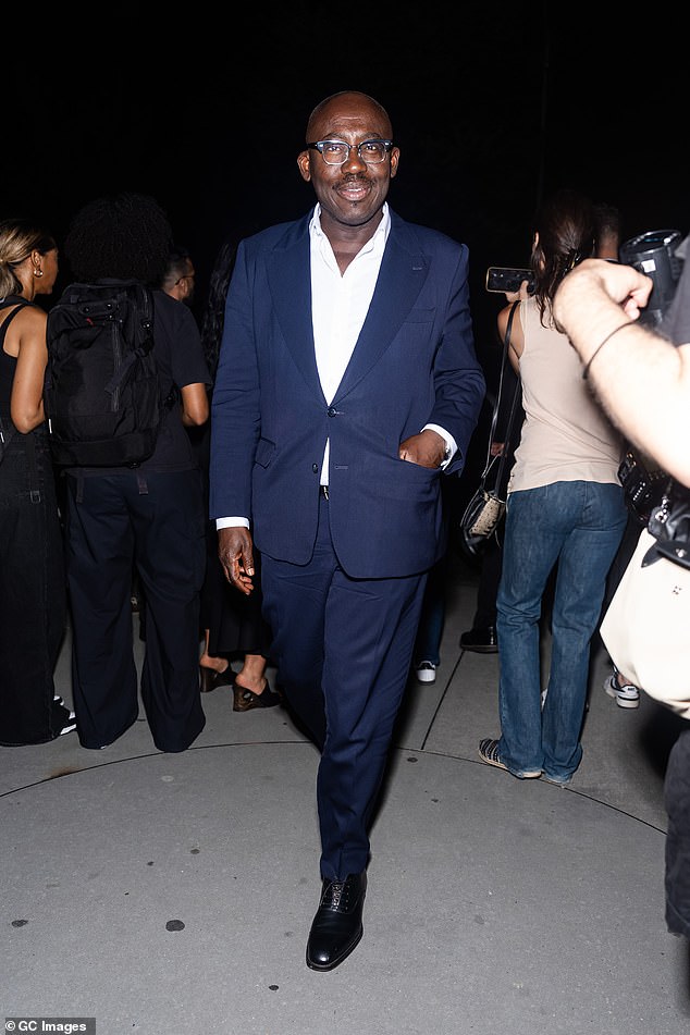 Former British Vogue editor-in-chief Edward Enninful, 52, also attended Friday's show, looking dapper in a navy suit.