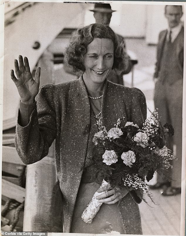 Beryl Markham waves as she returns to Southampton after her solo flight across the Atlantic.