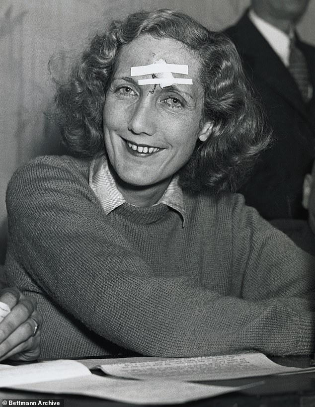 Beryl Markham is seen with a cut on her head covered with duct tape that she received when her plane made an emergency landing in Nova Scotia after crossing the Atlantic.