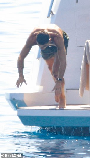 Ronaldo took a dip in the crystal-clear waters from the back of his yacht