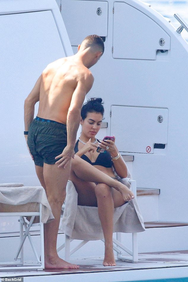 Ronaldo enjoyed the sun and, like Georgina, showed off a deep tan.