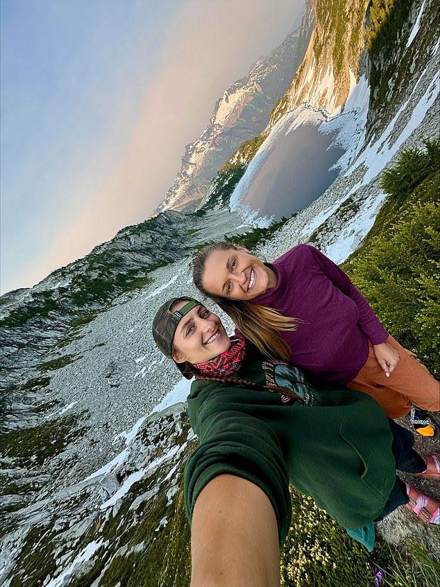 Jessee Clauson (right), 29, and Camille Avarella, 28, were descending Longs Peak in the Rocky Mountains when they caught the lanky grey creature on camera.