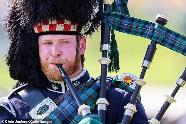 A piper from one of the Massed Pipe Bands performs in the arena during The Braemar Gathering 2024 at the Princess Royal and Duke of Fife Memorial Park on September 7, 2024 in Braemar, Scotland.