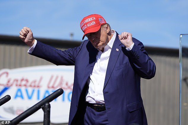 Trump dances as he leaves a campaign event in Mosinee, Wisconsin