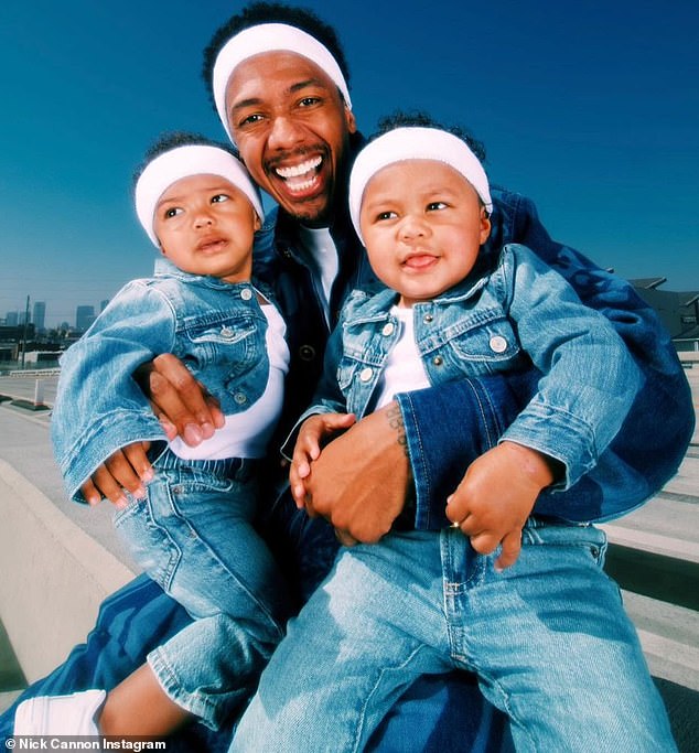 Nick is pictured with his three-year-old twins, Zion and Zillion, whom he shares with Abby De La Rosa, in a post celebrating his second birthday.