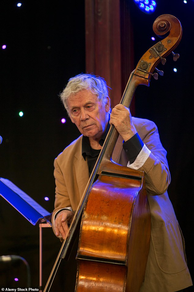 Flowers was a huge musical talent, playing the double bass, tuba and electric bass. Pictured: Flowers in 2015 at the Brighton Fringe