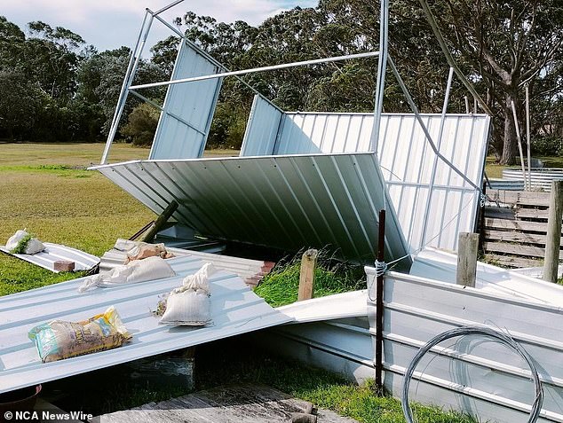 New South Wales suffered property damage due to strong wind gusts and residents are warned to be prepared for all types of weather (pictured, a destroyed shed on a property in New South Wales in early September)