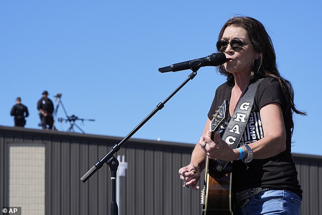 Country singer Gretchen Wilson had opened the event and endorsed the Republican as Secret Service snipers watched from nearby rooftops.