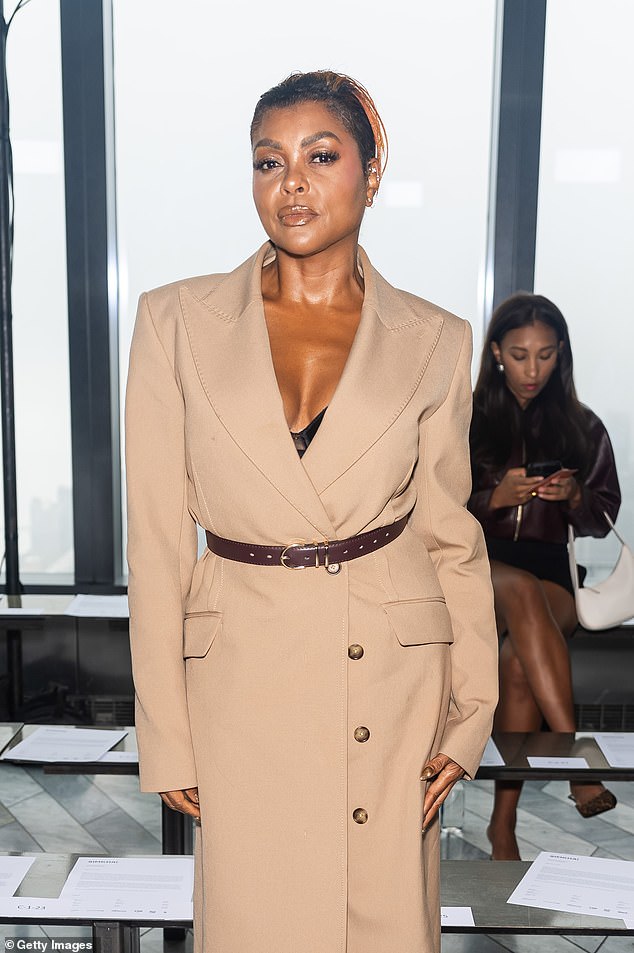 The 53-year-old The Color Purple actress wore a long beige blazer dress that showed off her black bra.