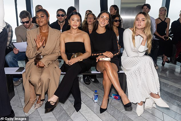 Charlotte Lawrence was also seen looking chic in a white dress and matching boots as she posed with Taraji, Suni and Aly.