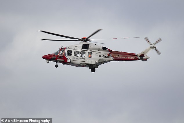 A massive search and rescue operation was launched after Jenny failed to emerge with the rest of the group towards the shore at Wardie Bay (pictured: a helicopter hovering overhead)