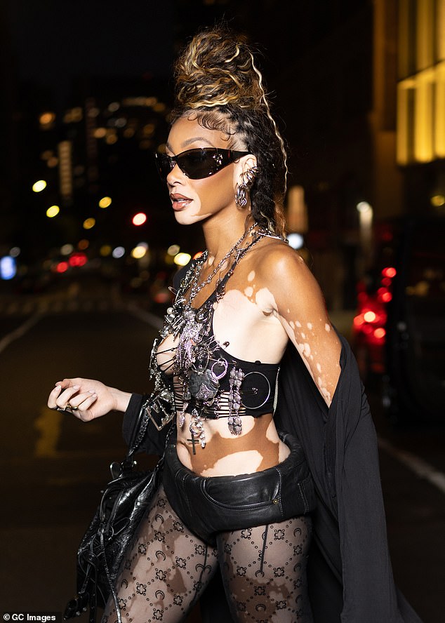 She accessorized her look with chunky jewelry, dark-framed sunglasses and a sleek leather handbag.