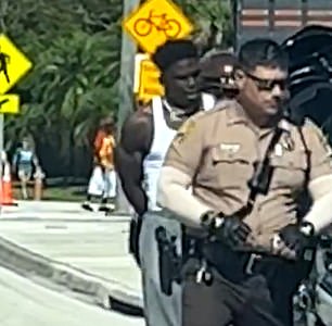 Tyreek Hill handcuffed after being arrested by police