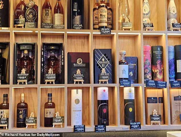 The most expensive items were displayed behind the cash register, including a bottle of Dalmore single malt whiskey imported from Scotland, aged for 30 years and priced at a staggering $5,200.