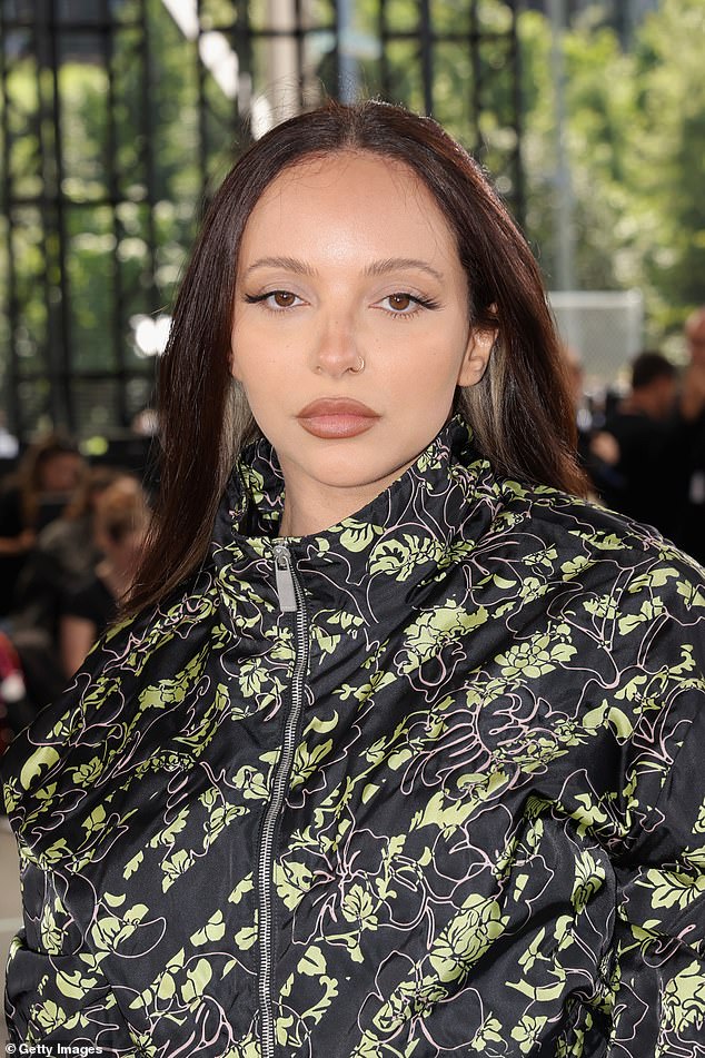 The 31-year-old Angel Of My Dreams singer made her entrance wearing a black and green striped quilted jumpsuit, embellished with pink floral detailing.