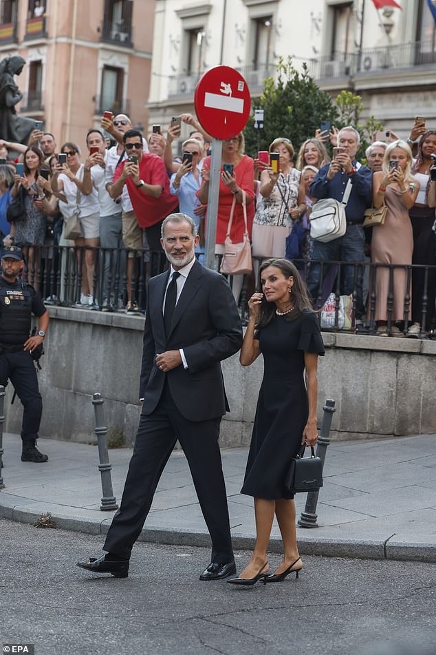 Crowds gathered near the Armed Forces Cathedral in the Spanish capital, with royal fans hoping to get a photo of the King and Queen.