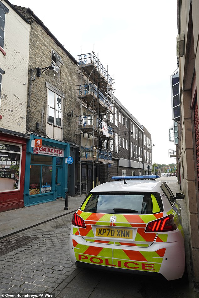 A police car parked outside the building in Bishop Auckland, County Durham, on July 31.