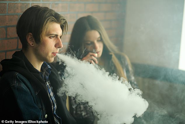 Blood tests and ultrasounds revealed that both vapers and smokers showed signs that their blood vessels were not working as well as the non-smoking and non-vaping group (file image)