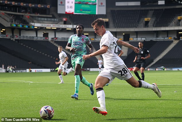 But 20 years after their creation, MK Dons find themselves languishing in League Two.