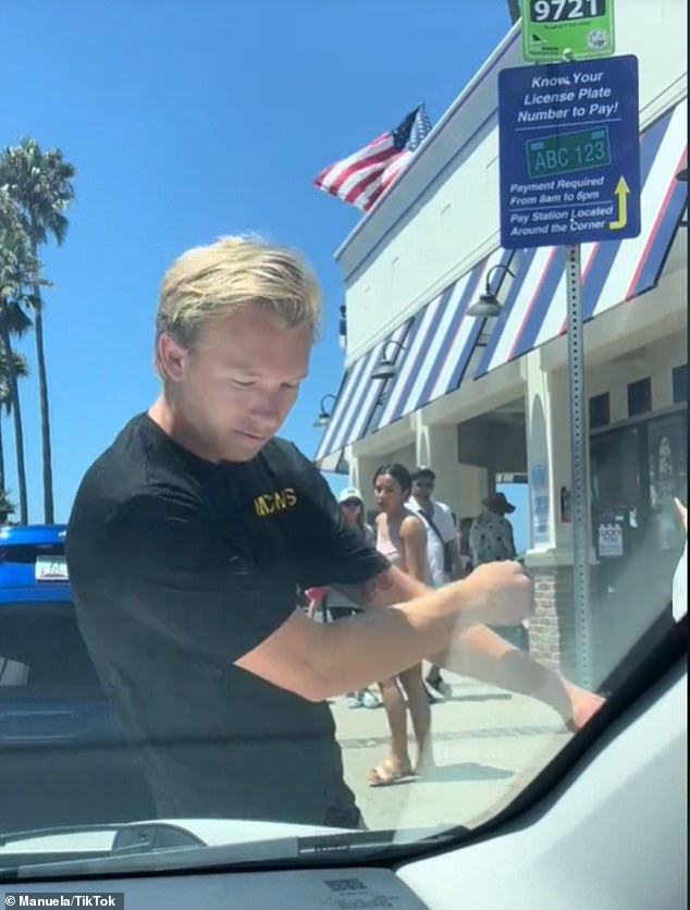 Nigel Ford, pictured, was caught on camera crashing into the side of a car after another driver snatched his parking spot.