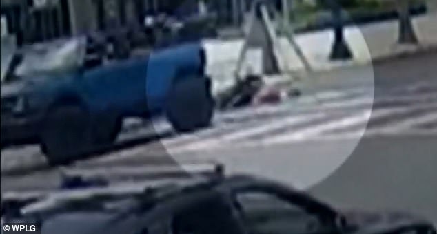 The camera captured the moment the blue Ford Bronco driven by Demarcus Harrington collided with Khedr's electric bike, sending it headfirst into the sidewalk.