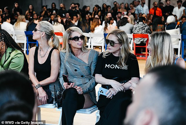 Both followed Paris' lead, completing their looks with dark sunglasses for a coordinated front-row appearance.